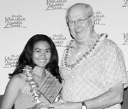 Ruth Gerola is awarded a 2006 Kaimana Scholarship by HMSA senior vice president Cliff Cisco. Photos courtesy of HMSA.