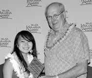 Jaime Kataoka stands with Cliff Cisco as she receives her 2006 Kaimana Scholarship award.
