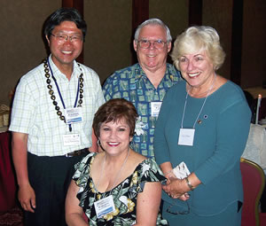 Keiji Nakakubo (left), Friendship committee chair for District 2650 in Kyoto, and his new Rotary friends from the Waialua-Wahiawa club: president-elect Oran Spotts, Nancy Barry and (sitting) Mary Antonio. Photo by Robert Van Reisenwitz.