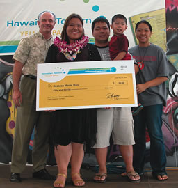 Ron Montgomery (left), vice president and general manager of Hawaiian Telcom’s directories, honors Mililani High School’s Jessica Ruiz for her third pace win in the high school division of the Hawaiian Telcom Yellow Pages art contest. With Jessica are family members Michael, Matthew and Sara Ruiz. Photo courtesy of Hawaiian Telcom Yellow Pages.