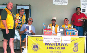 Members of the Wahiawa Lions Club organized two community drives last month to collect money and school supplies for needy public school students. Pictured are Lions Joe Francher, Henry Lee, Paul Misaka, Tino Bagasol, Donald Sagara and potential Lion Ivan Felix. Photo by Jack Kampfer.