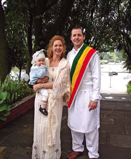 Kristine Altwies and daughter Ava celebrate 1999 (in the Coptic Christian calendar) in 2006 in Ethiopia with her brother Justin, a former East Oahu resident, who has donned local clothes for the new year. Photo from Kristine Altwies.