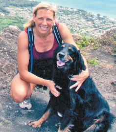 Carol Jaxon on top of Kuliouou ridge with her dog Butler. Photo from Carol Jaxon.