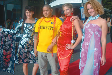 Most Promising Award winner Ron Kayano (in yellow) poses with models wearing his designs