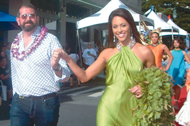 Miss Hawaii Chanel Wise models fashions by her  escort, designer Michael Kaye