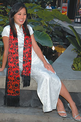 Jacklyn Ma: white long double fish qi pao $430, sunflower scarf $160