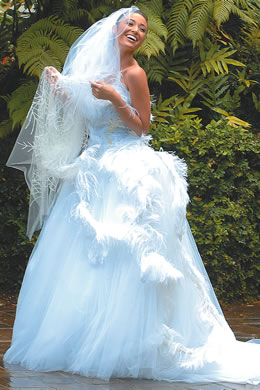 Aureana Tseu: White wedding gown with feathers, rhinestones and beads by Eric Chandler of 2Couture