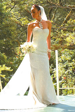 Aureana Tseu: Serpentine style ivory traditional wedding gown with long train and Swarovski jewel