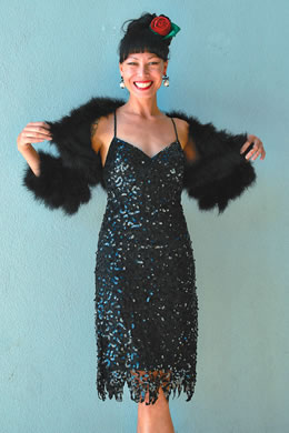 Kitty Chow: Betsey Johnson black sequin Chicago dress $398, black maribou shrug $188, large rhinesto