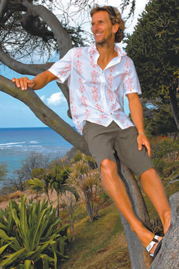 Manu Bouvet: Oxbow short-sleeve button-down shirt $65, cargo Bermuda shorts $70, leather slippers on
