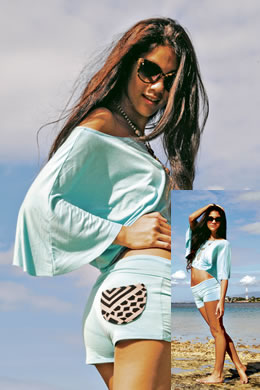 Calla Camero: Cassandra Rull flare-sleeve turquoise top $55, turquoise booty shorts $50