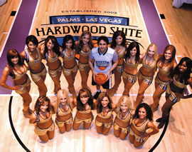 Palms owner George Maloof is surrounded by the Kings cheerleaders at the christening of the new Hardwood Suite