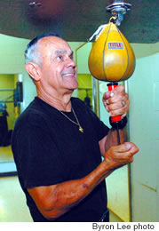 Fred Pereira keeps the speed bag, and his kids,<br />
pumped up