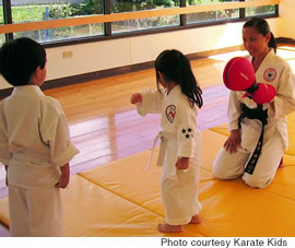 Geri Berger, Mrs. Hawaii 2004, teaches an all-girls Karate Kids class at the Nuuanu YMCA