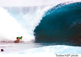 Young gun Mark Healy sizes up a tube at Pipeline