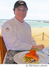 Fred DeAngelo and his Togarashi Salmon at Ola on the beach at Turtle Bay