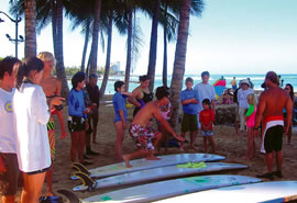Volunteer surf instructors lead the H.U.G.S. kids at Surf 4 H.U.G.S. last weekend
