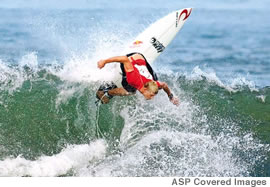 Mick Fanning from Australia, known as the fastest surfer in the world, rips it up at the OP Pro