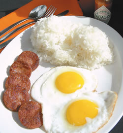 Breakfast at A Taste Of New York Deli And Market features Portugeuse sausage, rice and eggs