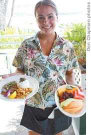 Susan Ventrucci serves an ahi dinner and fruit plate