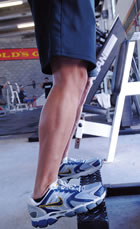 Standing calf raise: Place toes on step with heels down, tippy toe to bring your heels up, hold and release, do 10-20 repetitions, three times