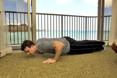 Wrong: When doing push-ups, make sure your hands are not too far<br />
from the body as in the picture above