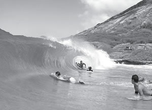 Jamie Ballenger of hawaiianwatershots.com captures a classic moment at Sandy Beach
