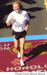 Paul Leo Klink, chairman emeritus of Aloha Direct, finishes the 2006 Honolulu Marathon after losing 172 pounds