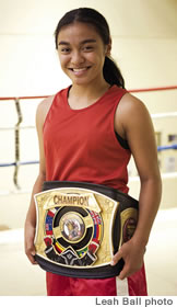 Alyssa-Lenda Kane and her world title belt