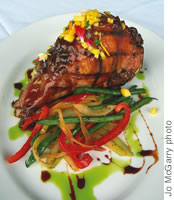 Pork chops are given the Sam Choy touch with fresh mango salsa

