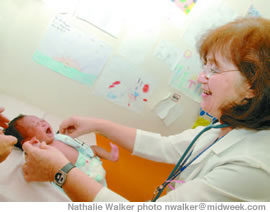 Dr. Sylvia Pager examines 3-week-old Reise Pickett