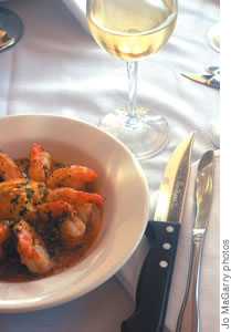 Tender barbecue shrimp with layers of butter and pepper is a signature dish at Ruth's Chris