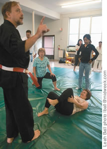 Instructor Steve McLaughlin, with Ann Yakuma on the mat