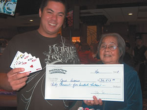 Jared Victorino and Grandmother Helen with his $30,000 check from the Fremont