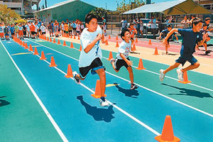 Young athletes sprint at the Speed and Quickness class