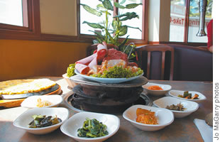Migawan Korean Restaurant uses charcoal at its yakiniku tables