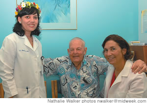 Dr. Kavita Sharma with 90-year-old patient John E. Broch and nurse Valisa Saunders