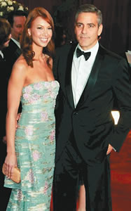 Sara Larson and George Clooney at the Oscars