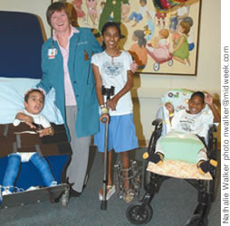 Dr. Ellen Raney with Shriners patients Makalei Arthur, Neha Kajol Prasad and Raynard Spencer
