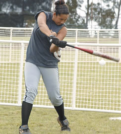 Campbell High softball player Kai Clark practices her swing. Photo by Nathalie Walker