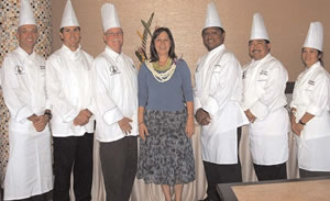 Culinary program coordinator for The Pearl, Tommylynn Benavente stands with (from left) chef Advertising / 529-4700 instructors Ian Riseley, Michael Scully and David Millen, lab assistant Jason Fernandez, cafeteria manager Travis Kono and chef instructor Linda Yamada. Photo courtesy of The Pearl.