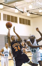 Campbell’s Patrick Ward goes for a basket shot against Kapolei in a Jan. 2 matchup. Photo by Byron Lee