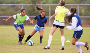 Kapolei soccer layers Liana Gualdarama, Kristen Otsuka, Jenna Wagner and Carly Vidinha practice their game. Photo by Byron Lee
