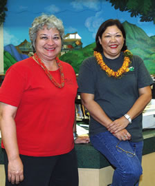 Library branch manager<br />
Sandy Akana (left) is retiring this month from the Kailua Library, and her children’s librarian Patti Meerians will step up to fill the job.<br />
Photo by Nathalie Walker, staff photographer.