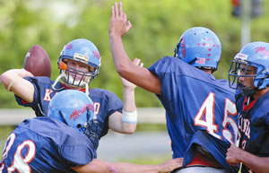 First Team All-Star and Kalaheo quarterback Cody von Appen (with ball) at practice. Photo by Byron Lee
