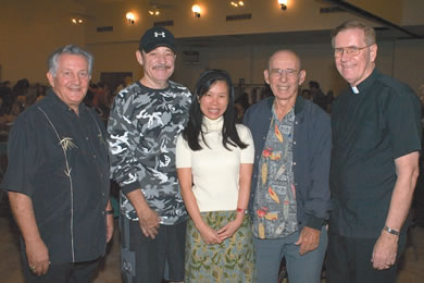 Deacon Ernie Carlbom, Bob and Maria Freebairn, Ed Medeiros and Father Dennis Koshko