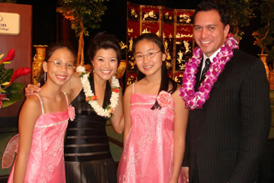 Stephanie Lum and Walter Makaula pose with Elvina Zhang and Stephanie Lum