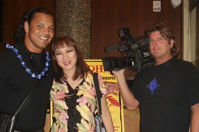 Geno Segers (Mufasa) with KITV news anchor Pamela Young and KITV cameraman Dan Churma