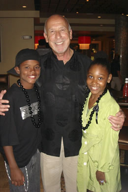 Giovanni Pastrami owner/operator Bob Bach with Trevor Jackson (young Simba) and Jamani Epps