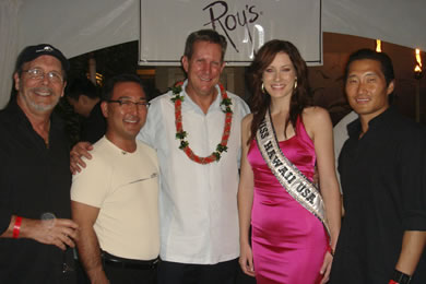 The Wyland Waikiki general manager Robin Graf (center) with Kim Taylor Reece, Justin Yoshino